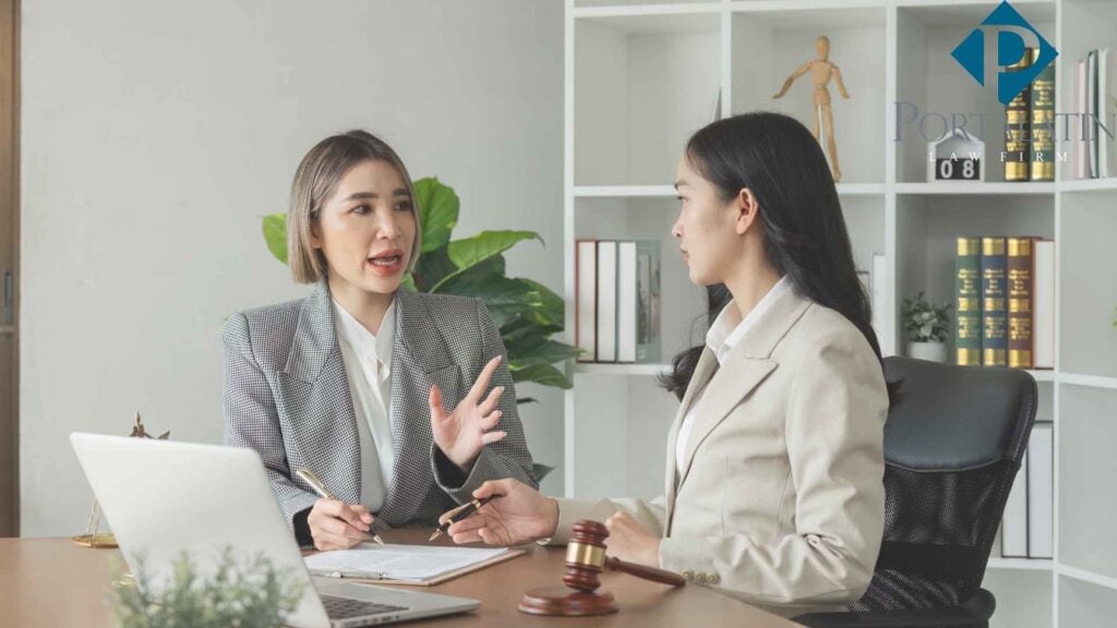 Two professionals discussing in office setting.