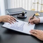 Lawyers discussing contract and legal documents