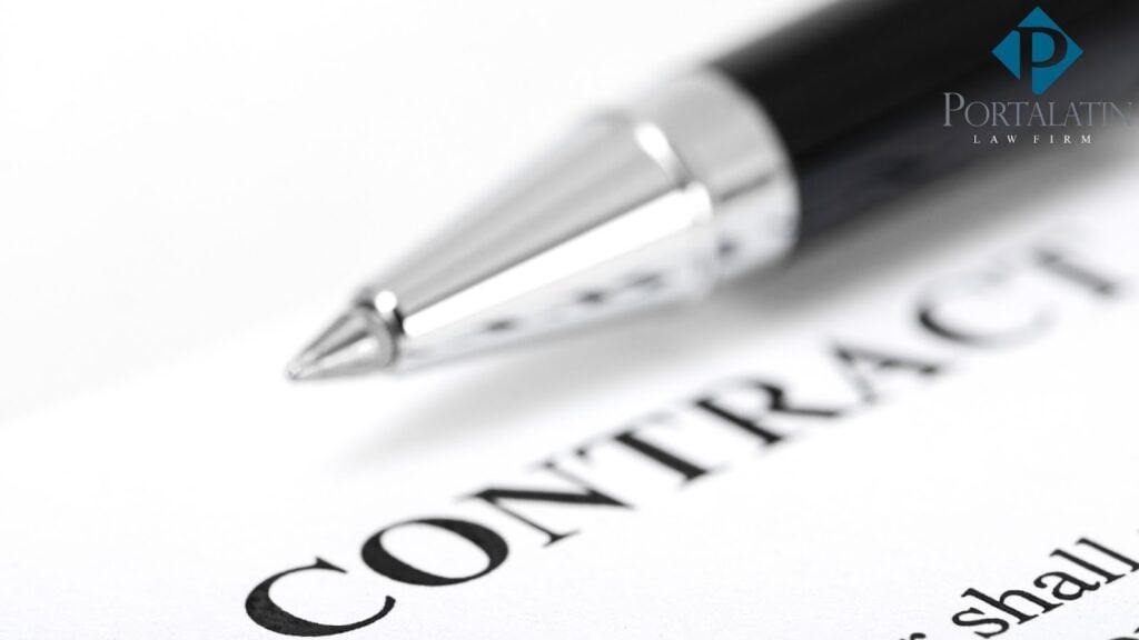 Pen resting on a legal contract document.