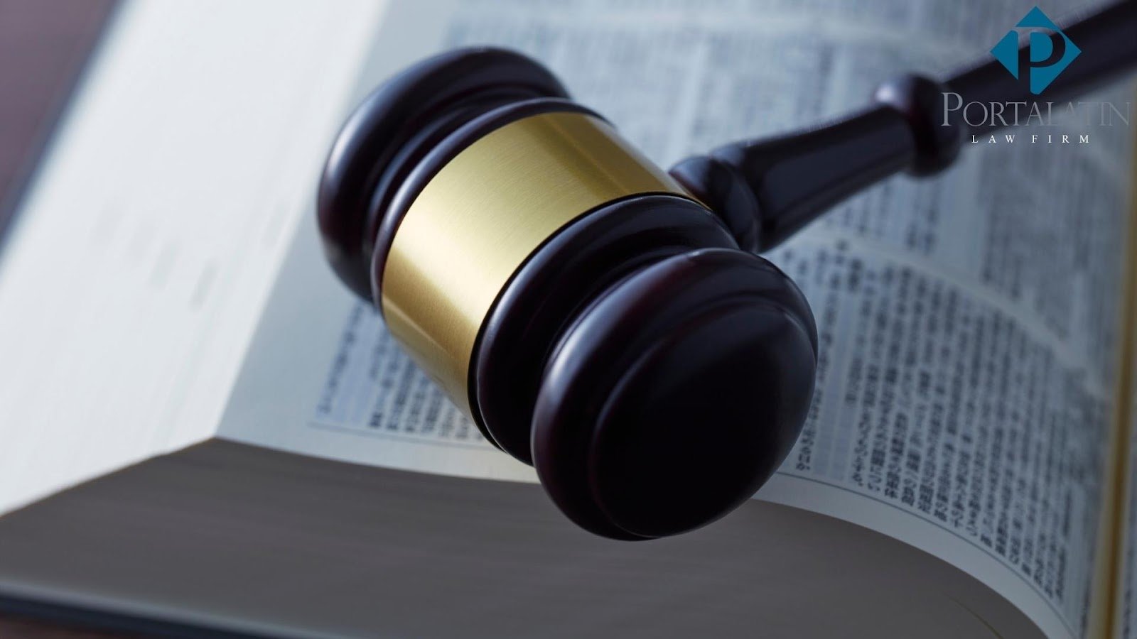 Gavel resting on open legal book