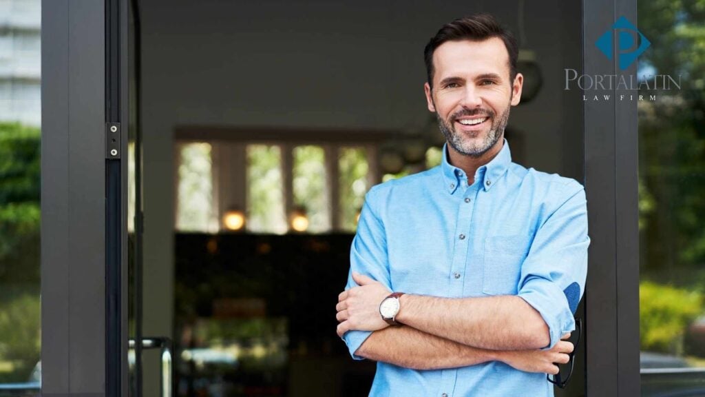 Man smiling at law firm entrance
