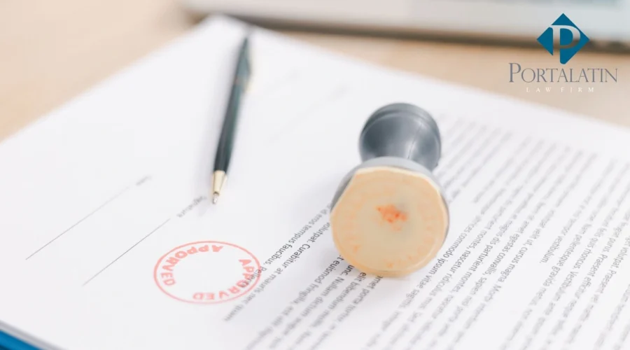 Approved legal document with pen and stamp