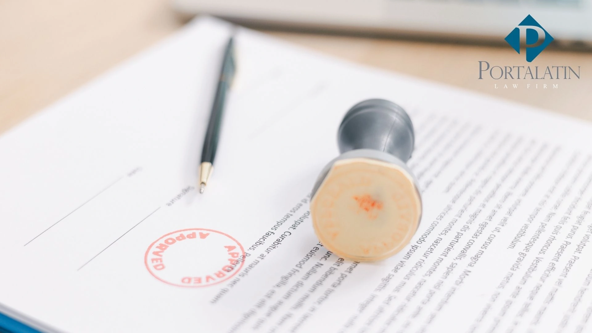 Approved legal document with pen and stamp