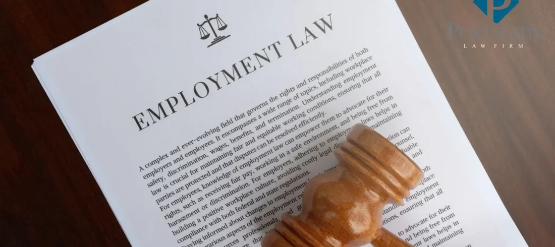 judge gavel laying on employment law documents