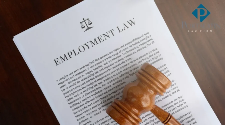 judge gavel laying on employment law documents
