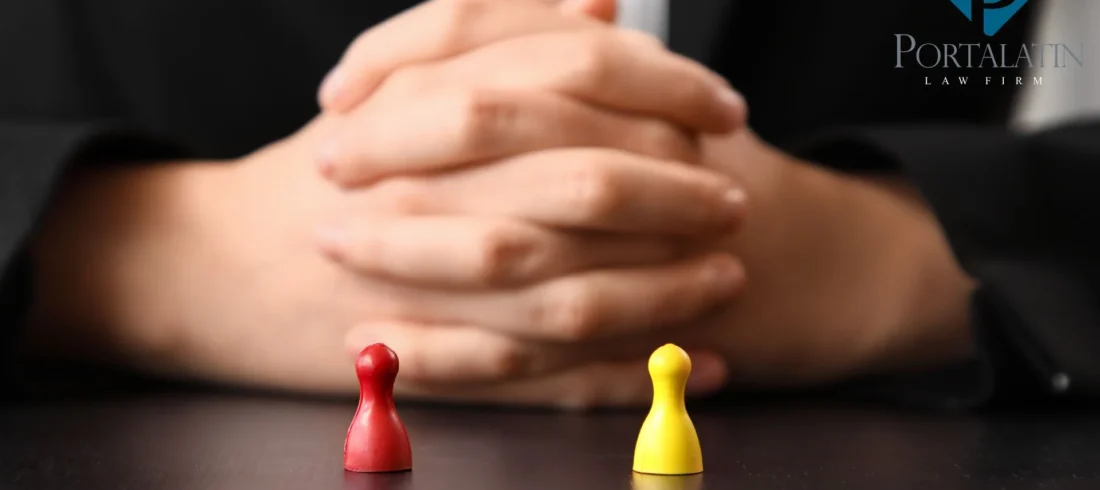 Lawyer behind red and yellow game pieces