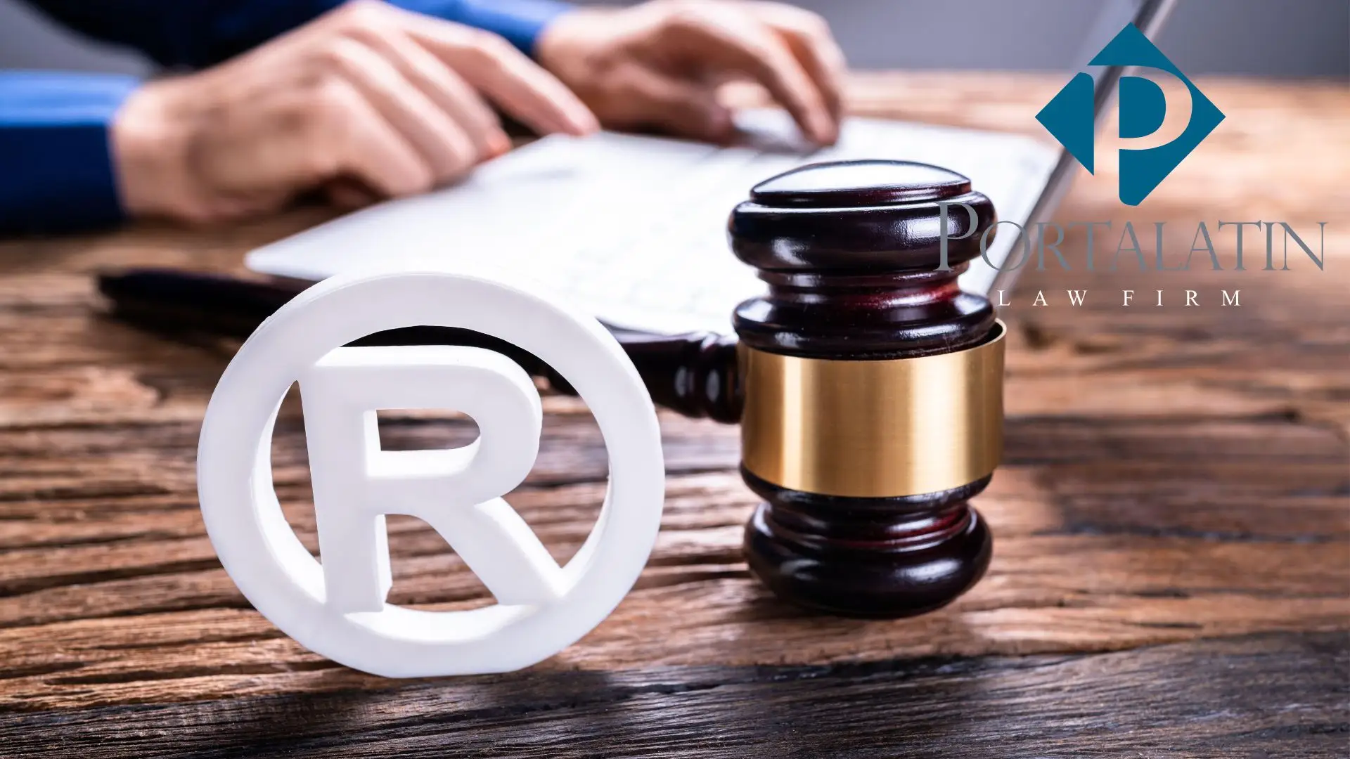 Gavel and registered trademark symbol on desk